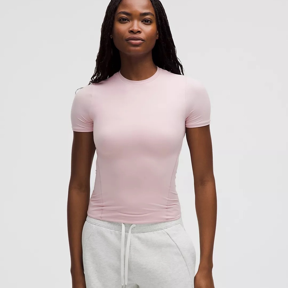 Lululemon Wundermost Nulu Hip-Len Crewneck Short Sleeve Top Pink Haze Size M NWT